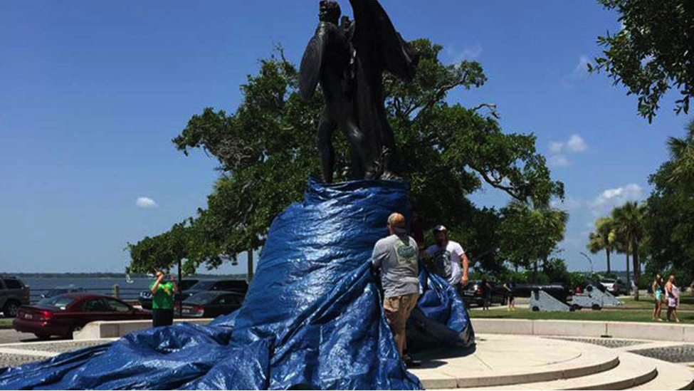Fig. 4: Spraypaint at CDC covered with a tarp by city workers.