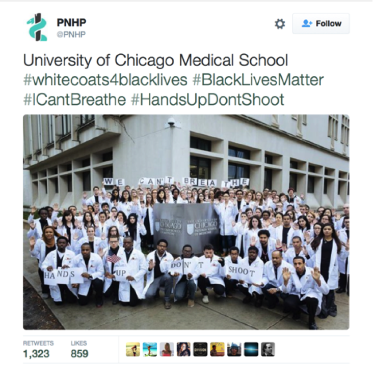 Screenshot of a tweet that reads: “University of Chicago Medical School #whitecoats4blacklives #BlackLivesMatter #ICantBreathe #HandsUpDontShoot,” above a picture of Medical School students holding their hands above their heads and holding protest signs reading “HANDS UP DON’T SHOOT.”