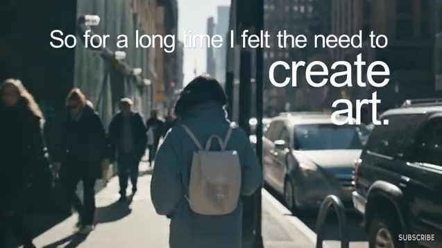 Screenshot of online video showing a person walking on a busy street