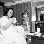 A Chinese professional working at a postpartum center, similar to the activities of a yuesao.