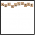 Scrabble tiles spelling out "vulnerable"